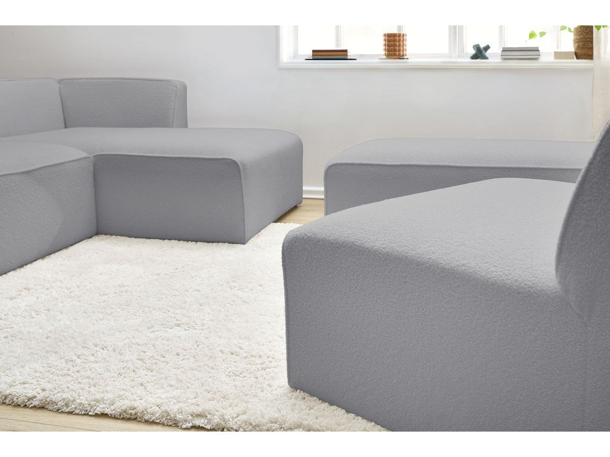 Canapé d'angle fixe modulable MEGEVE tissu bouclette avec 1 chauffeuse et 1 pouf - Angle droit