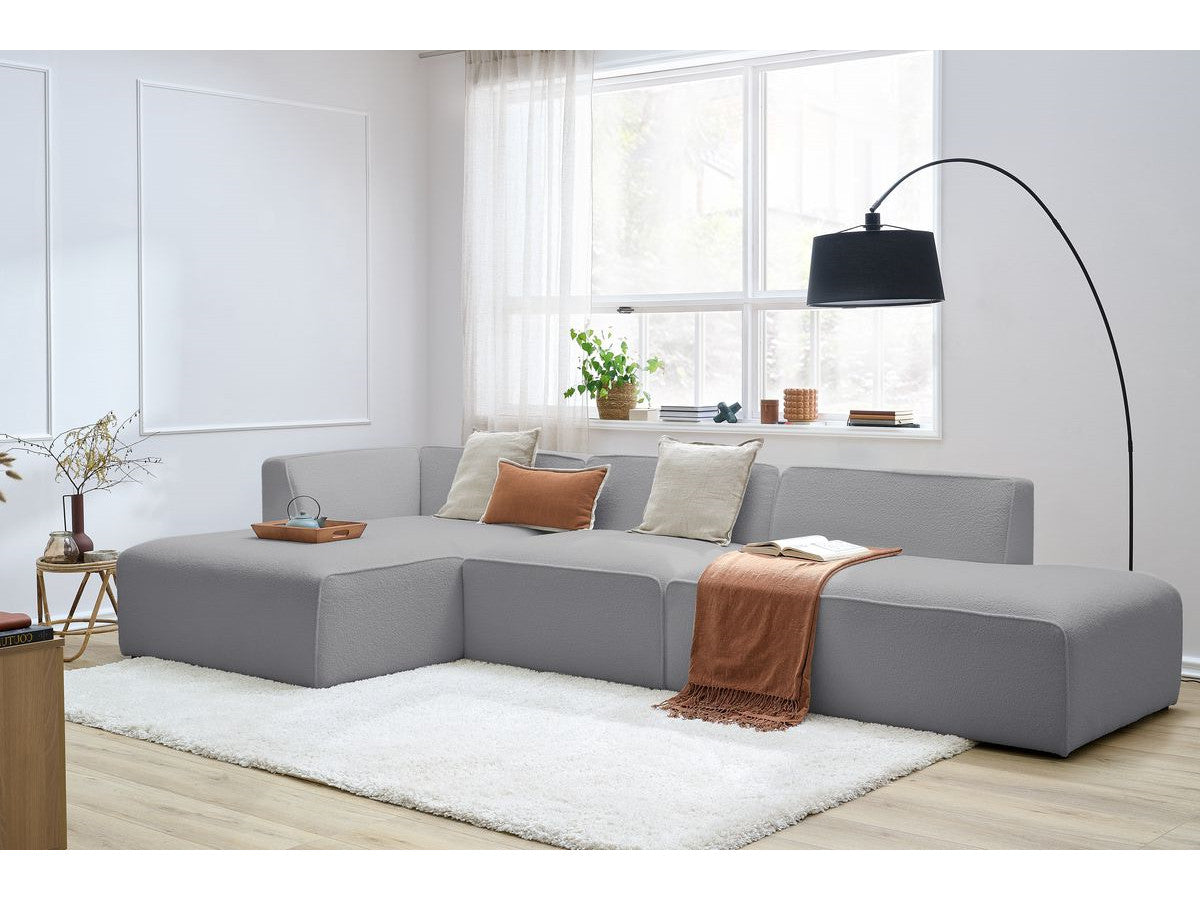 Canapé d'angle fixe modulable MEGEVE tissu bouclette avec 1 chauffeuse et 1 pouf - Angle gauche