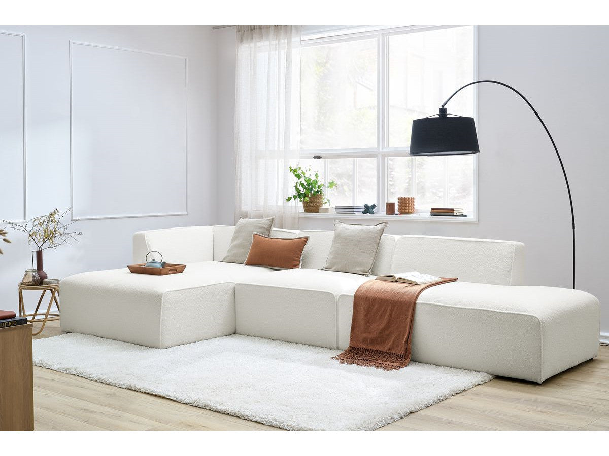 Canapé d'angle fixe modulable MEGEVE tissu bouclette avec 1 chauffeuse et 1 pouf - Angle gauche