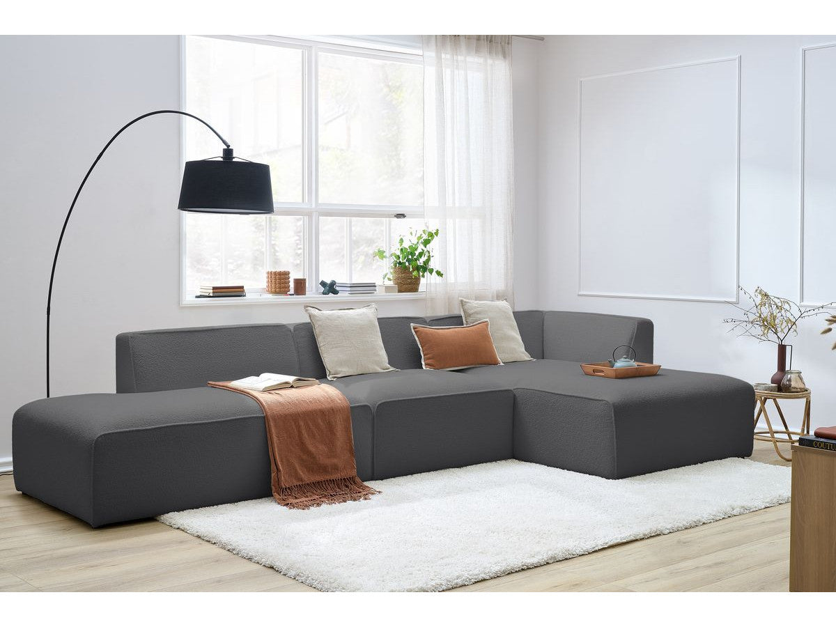 Canapé d'angle fixe modulable MEGEVE tissu bouclette avec 1 chauffeuse et 1 pouf - Angle droit