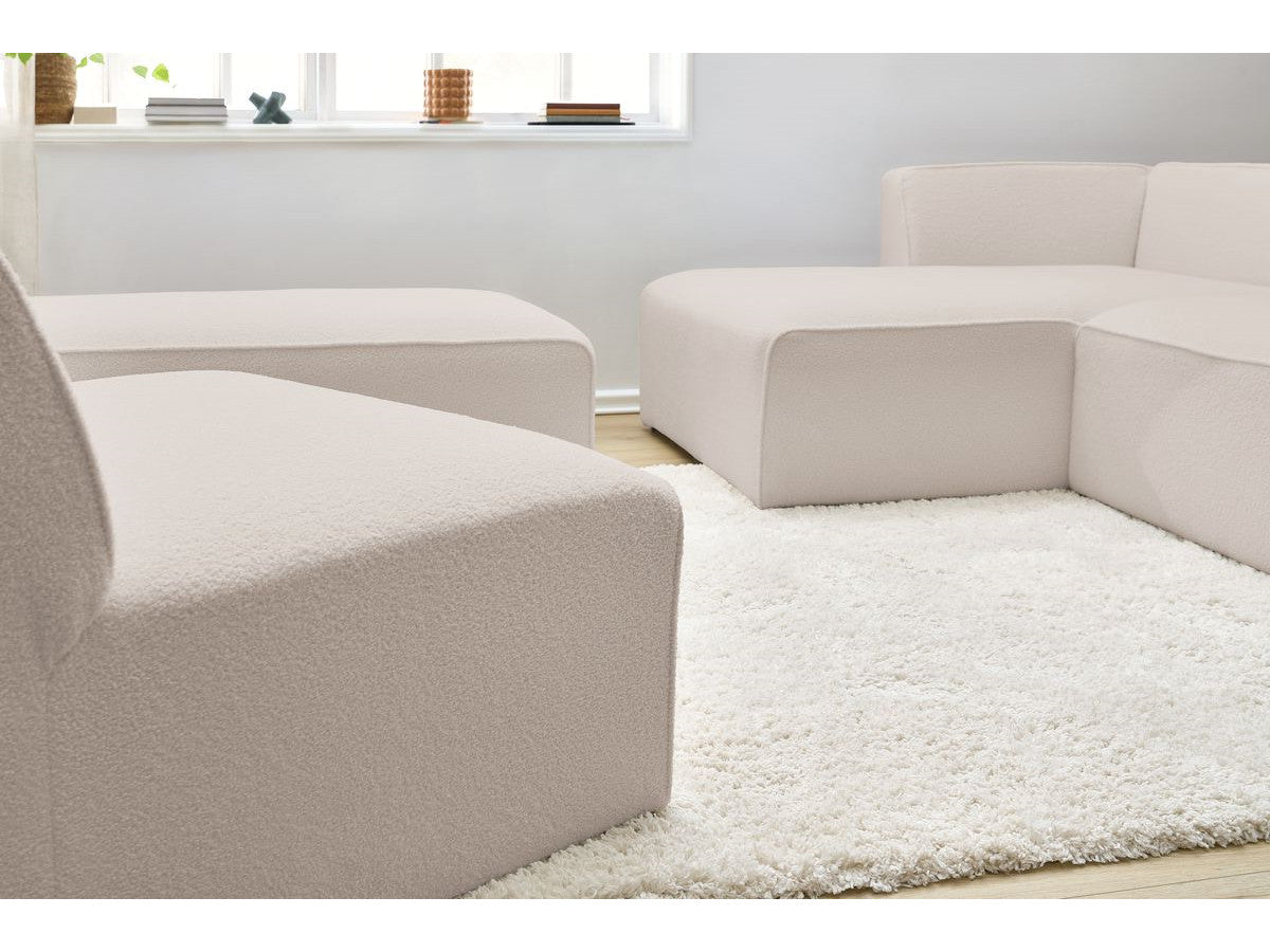 Canapé d'angle fixe modulable MEGEVE tissu bouclette avec 1 chauffeuse et 1 pouf - Angle gauche