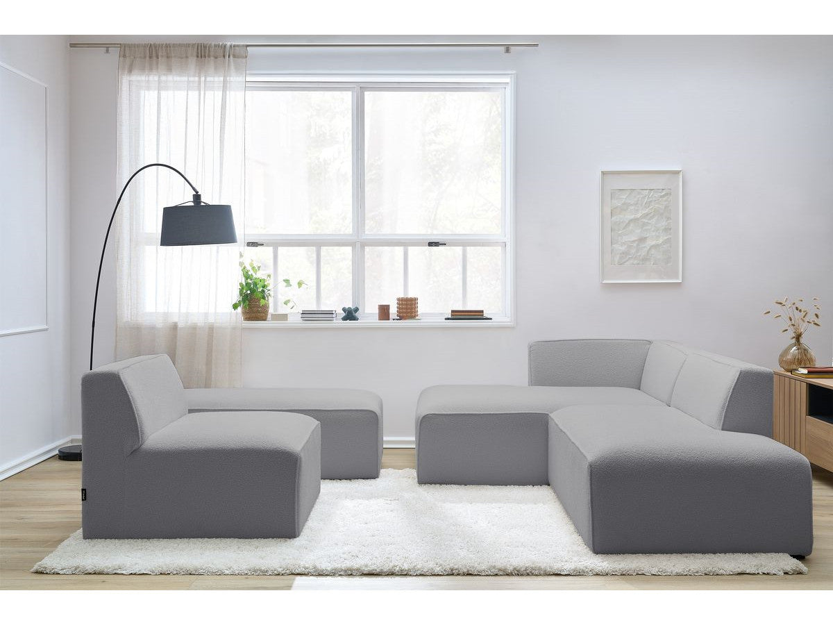 Canapé d'angle fixe modulable MEGEVE tissu bouclette avec 1 chauffeuse et 1 pouf - Angle gauche