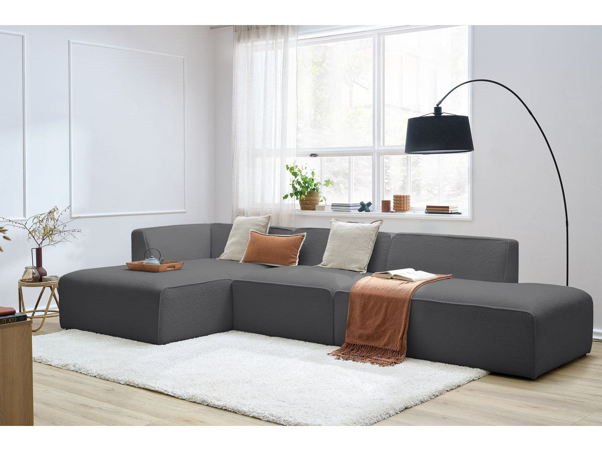 Canapé d'angle fixe modulable MEGEVE tissu bouclette avec 1 chauffeuse et 1 pouf - Angle gauche