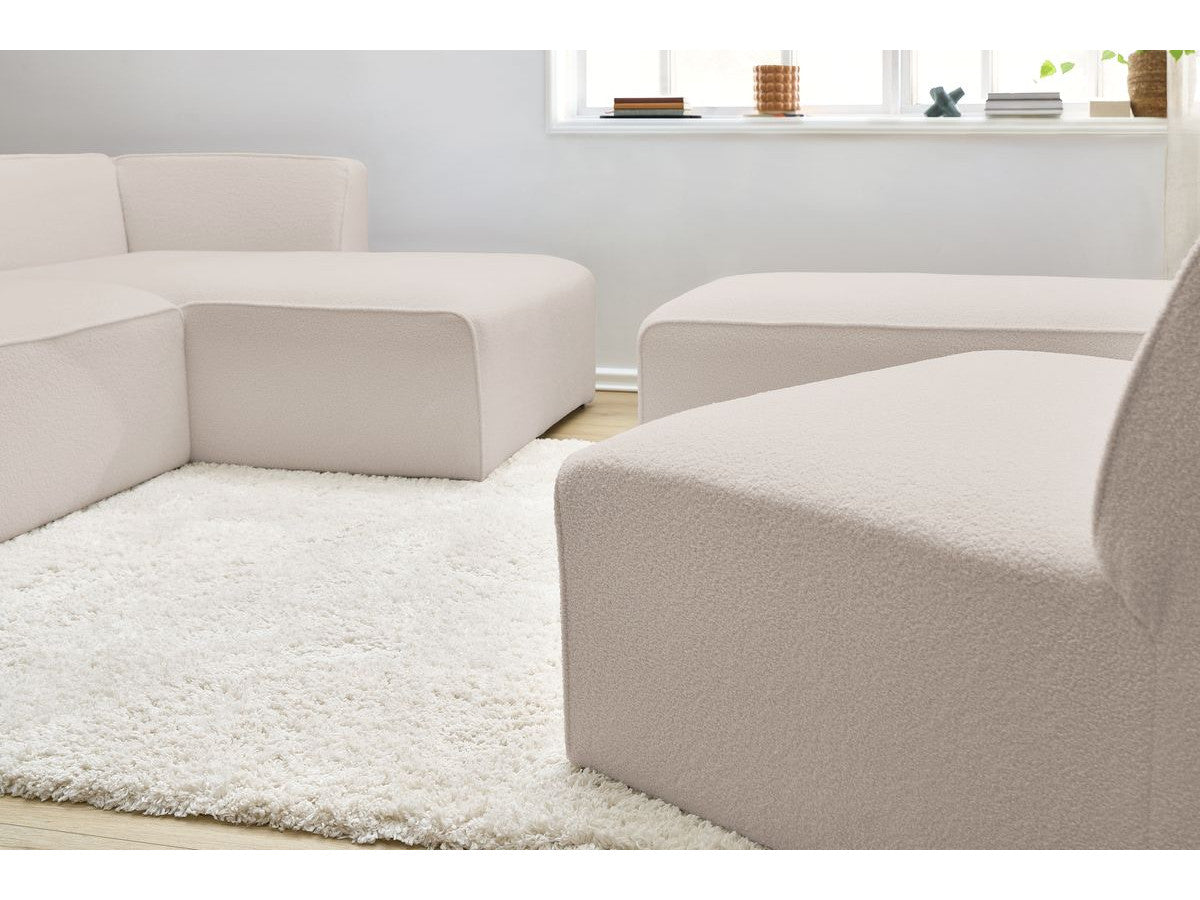 Canapé d'angle fixe modulable MEGEVE tissu bouclette avec 1 chauffeuse et 1 pouf - Angle droit