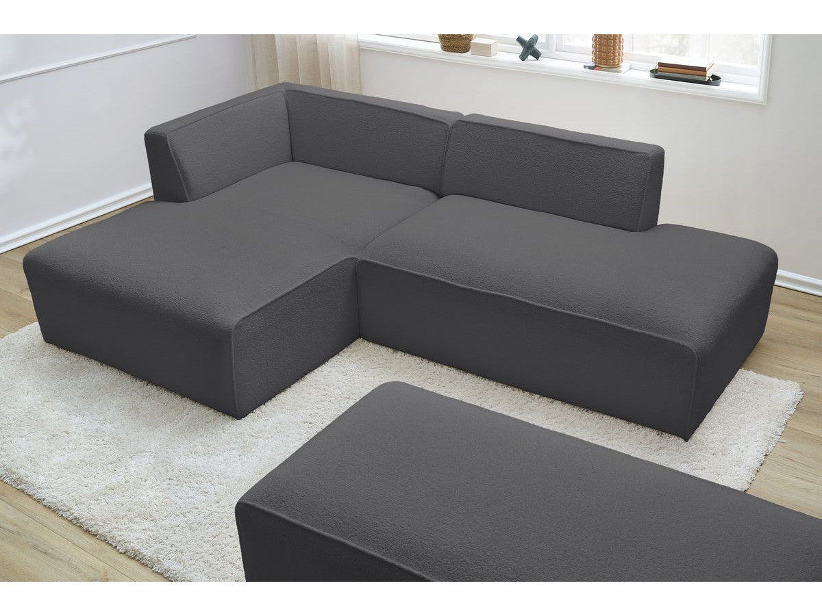 Canapé d'angle fixe modulable MEGEVE tissu bouclette avec pouf Angle gauche