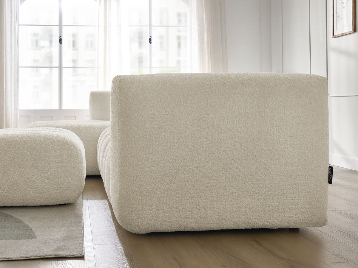 Canapé d'angle fixe TALIA tissu bouclette avec pouf - Angle gauche