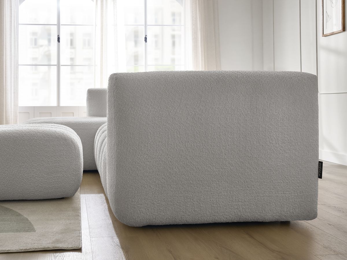 Canapé d'angle fixe TALIA tissu bouclette avec pouf - Angle gauche