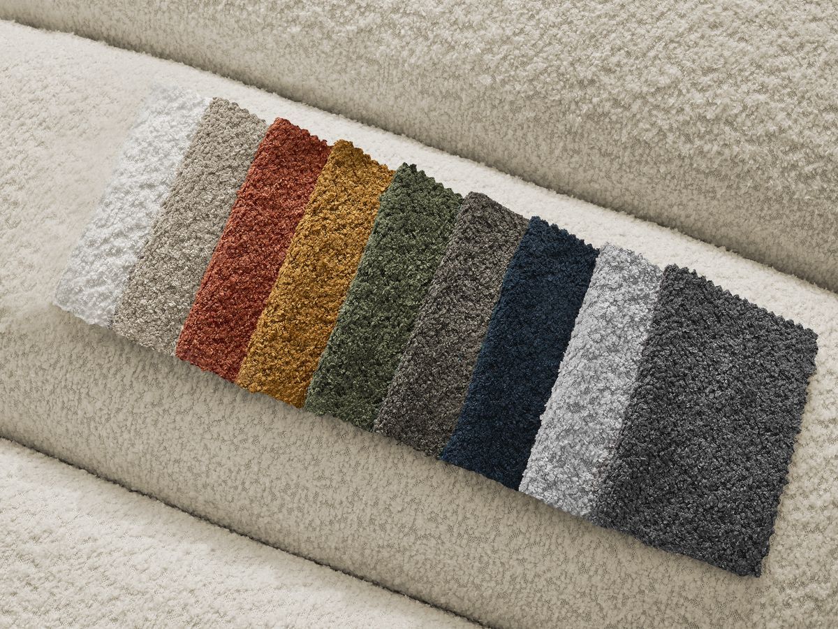 Canapé d'angle fixe TALIA tissu bouclette avec pouf - Angle droit