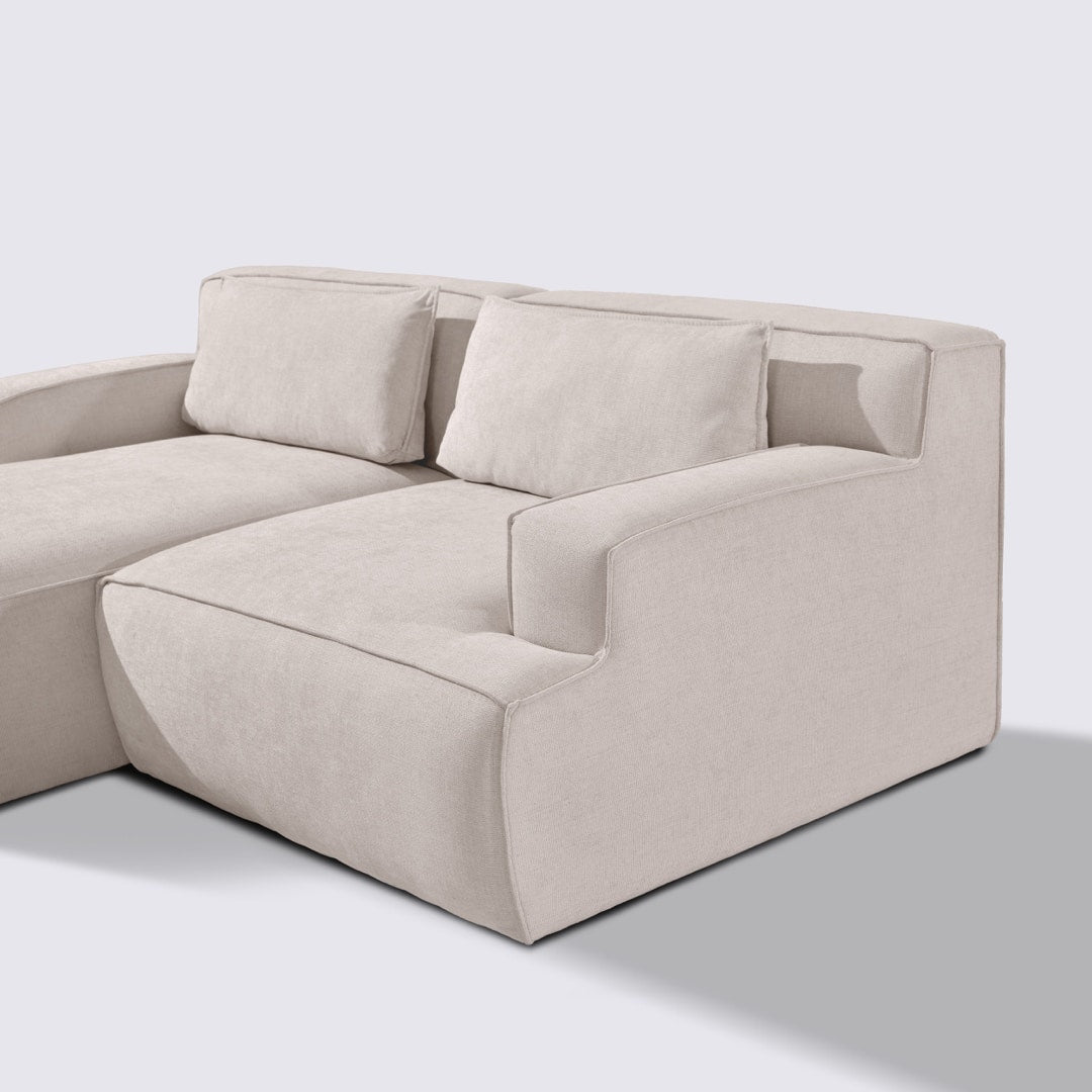 Canapé d'angle gauche modulable 3 places en tissu crème – Lorenzo