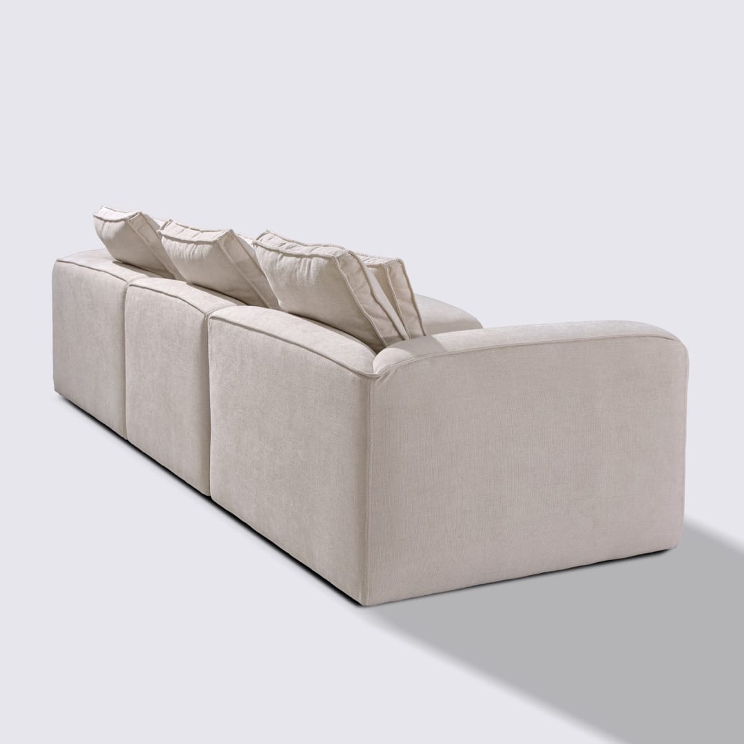 Canapé d'angle gauche modulable 4 places en tissu crème – Marbellia
