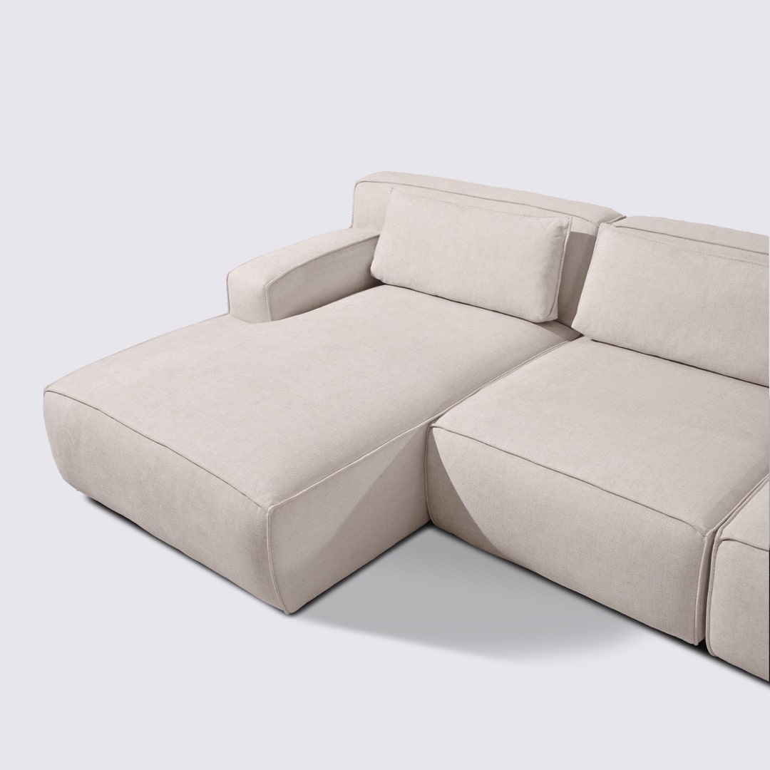 Canapé d'angle gauche modulable 4 places en tissu crème – Lorenzo