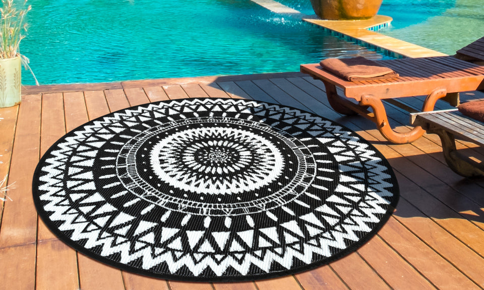 Tapis extérieur rond 150cm noir Maori motifs "ethniques"