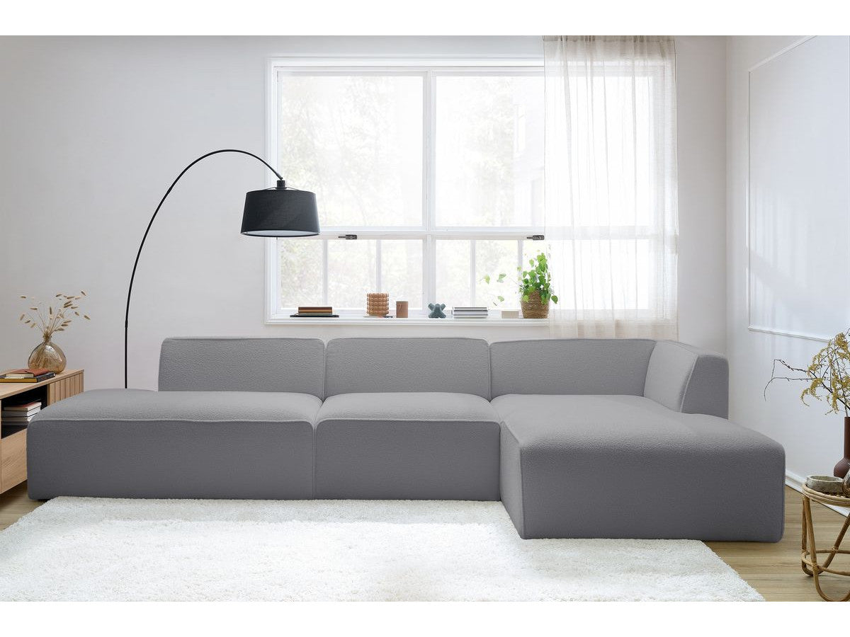 Canapé d'angle fixe modulable MEGEVE tissu bouclette avec 1 chauffeuse et 1 pouf - Angle droit