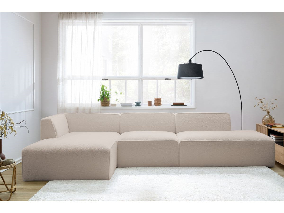 Canapé d'angle fixe modulable MEGEVE tissu bouclette avec 1 chauffeuse et 1 pouf - Angle gauche