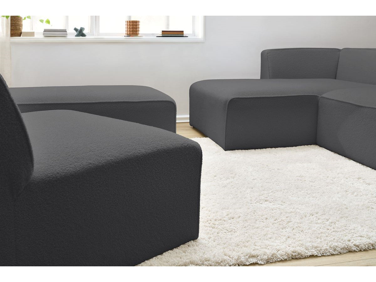 Canapé d'angle fixe modulable MEGEVE tissu bouclette avec 1 chauffeuse et 1 pouf - Angle gauche
