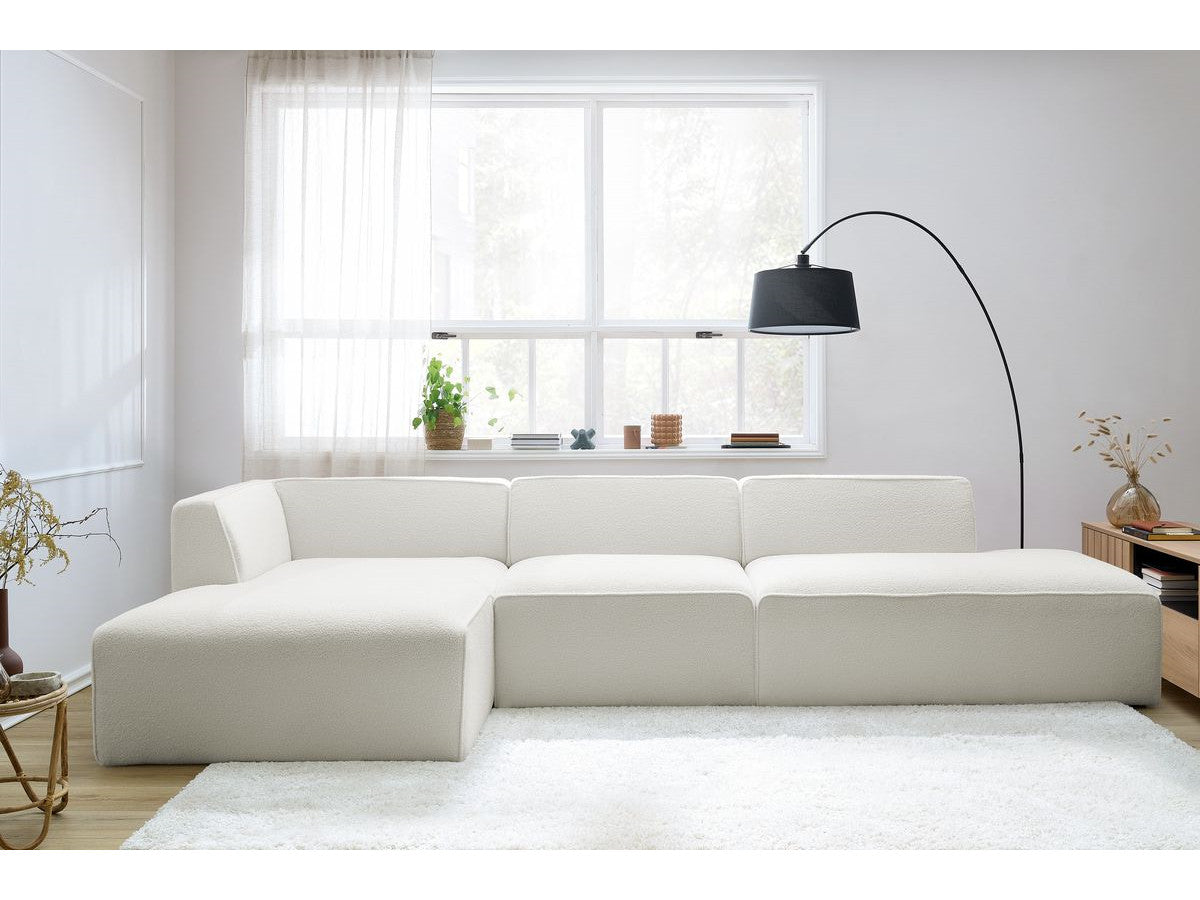 Canapé d'angle fixe modulable MEGEVE tissu bouclette avec 1 chauffeuse et 1 pouf - Angle gauche