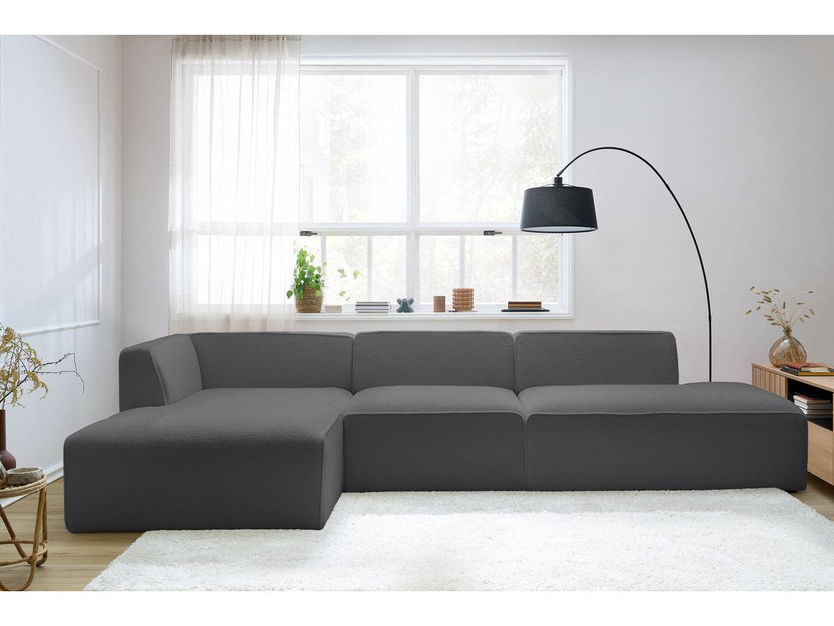 Canapé d'angle fixe modulable MEGEVE tissu bouclette avec 1 chauffeuse et 1 pouf - Angle gauche
