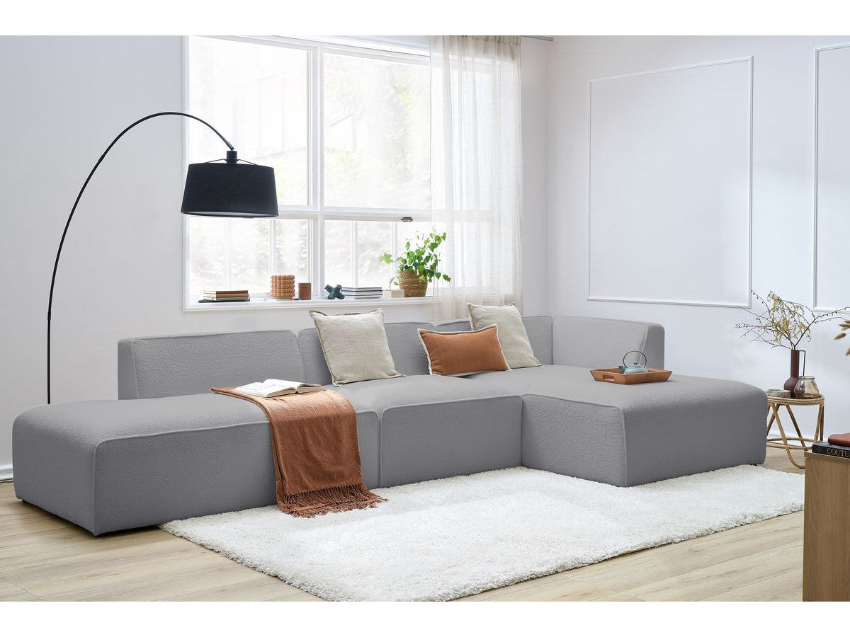Canapé d'angle fixe modulable MEGEVE tissu bouclette avec 1 chauffeuse et 1 pouf - Angle droit