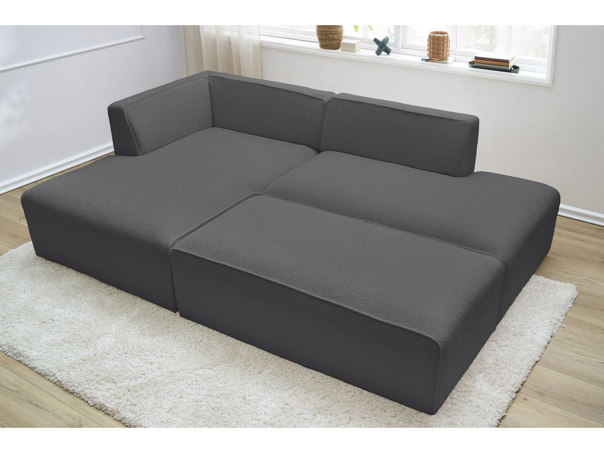 Canapé d'angle fixe modulable MEGEVE tissu bouclette avec pouf Angle gauche