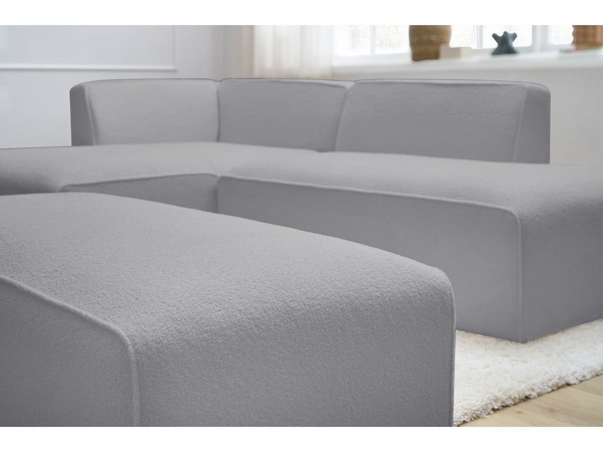 Canapé d'angle fixe modulable MEGEVE tissu bouclette avec pouf Angle gauche