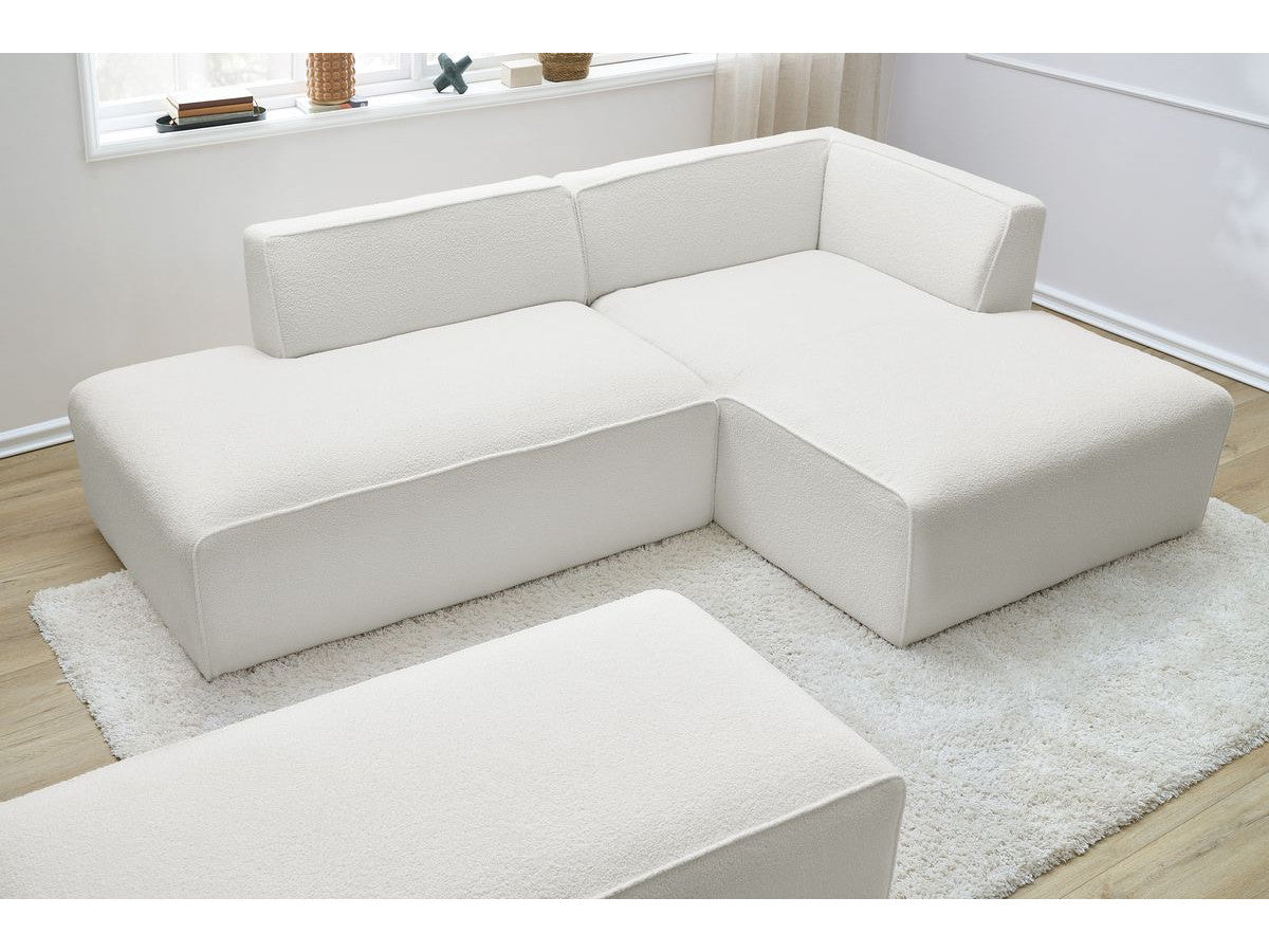 Canapé d'angle fixe modulable MEGEVE tissu bouclette avec pouf Angle droit