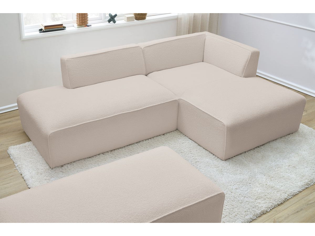 Canapé d'angle fixe modulable MEGEVE tissu bouclette avec pouf Angle droit