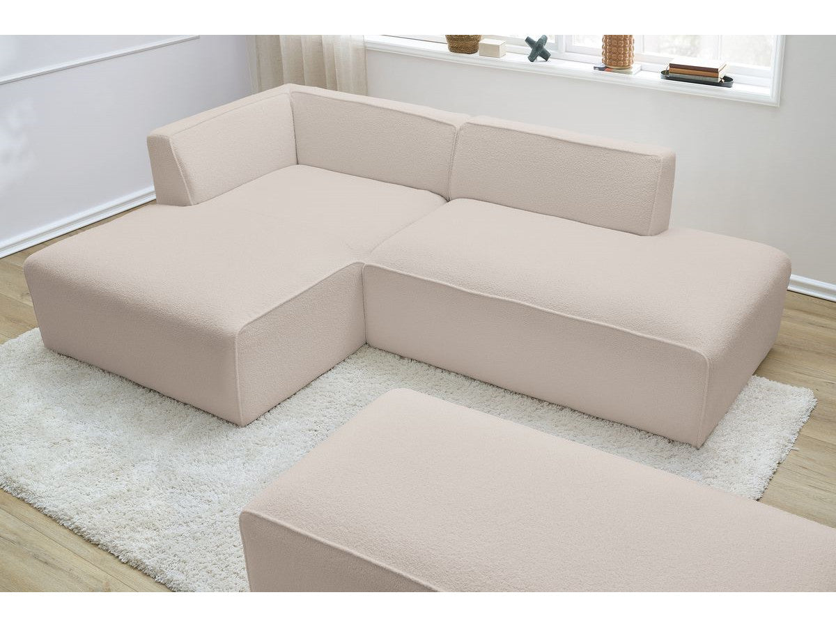 Canapé d'angle fixe modulable MEGEVE tissu bouclette avec pouf Angle gauche