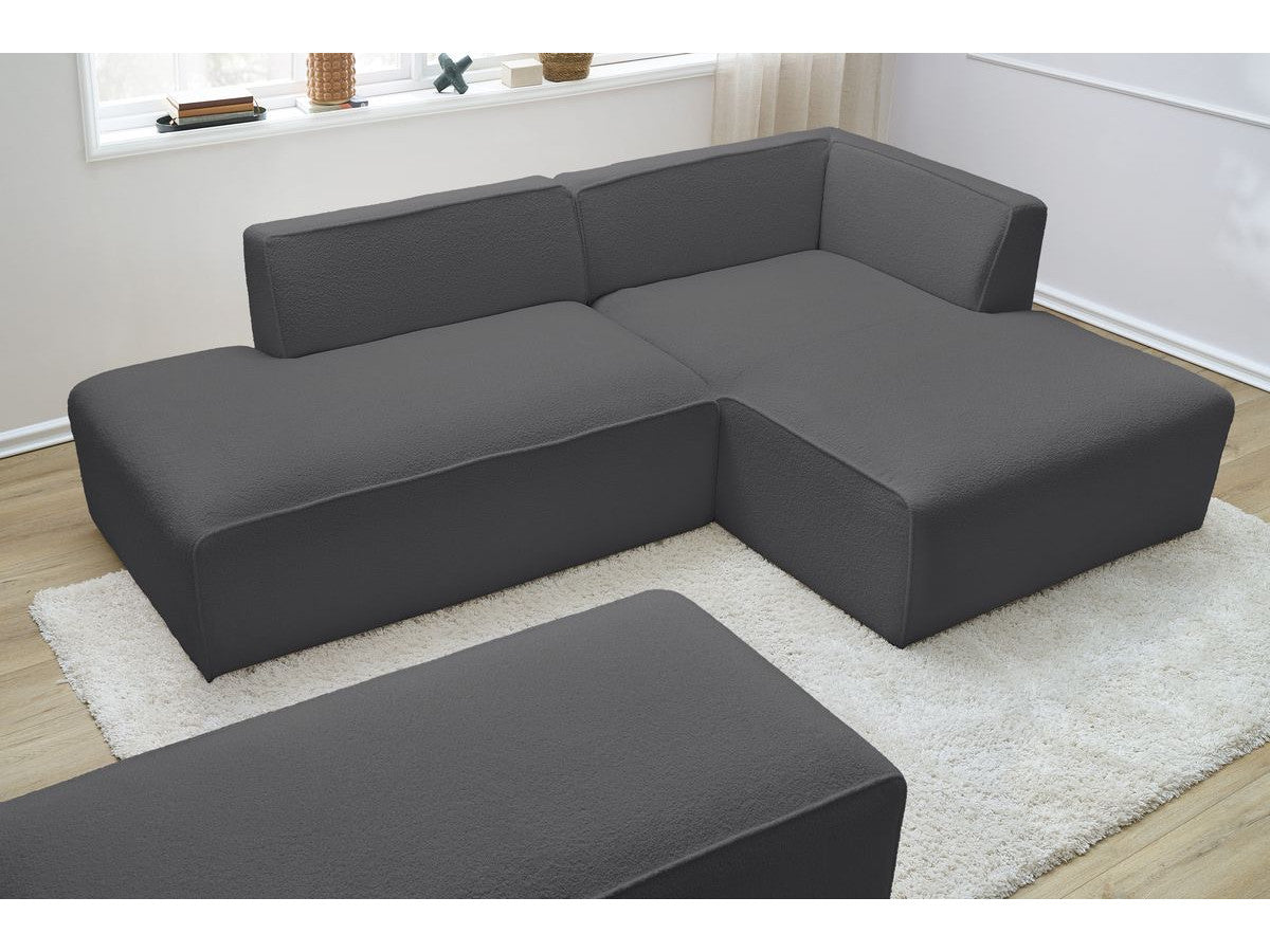 Canapé d'angle fixe modulable MEGEVE tissu bouclette avec pouf Angle droit