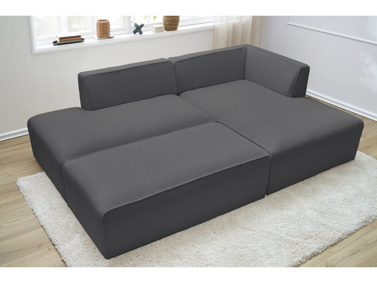 Canapé d'angle fixe modulable MEGEVE tissu bouclette avec pouf Angle droit