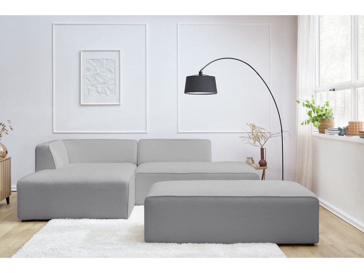 Canapé d'angle fixe modulable MEGEVE tissu bouclette avec pouf Angle gauche