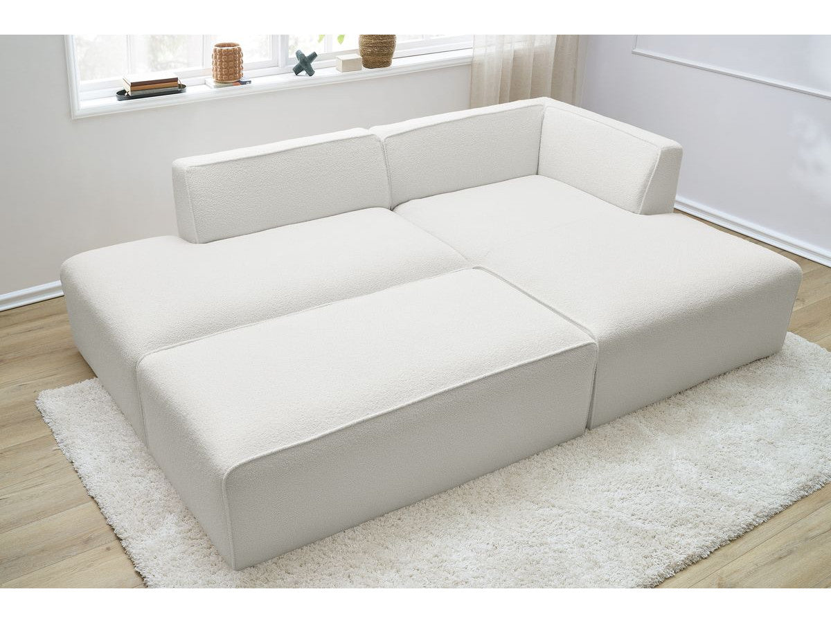 Canapé d'angle fixe modulable MEGEVE tissu bouclette avec pouf Angle droit