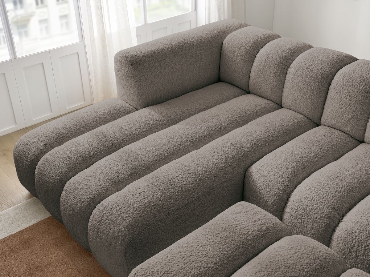 Canapé d'angle fixe TALIA tissu bouclette avec pouf - Angle gauche
