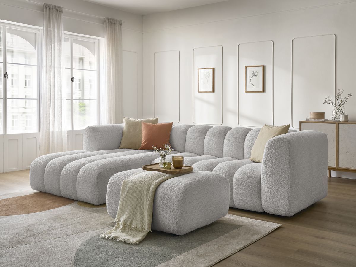 Canapé d'angle fixe TALIA tissu bouclette avec pouf - Angle gauche