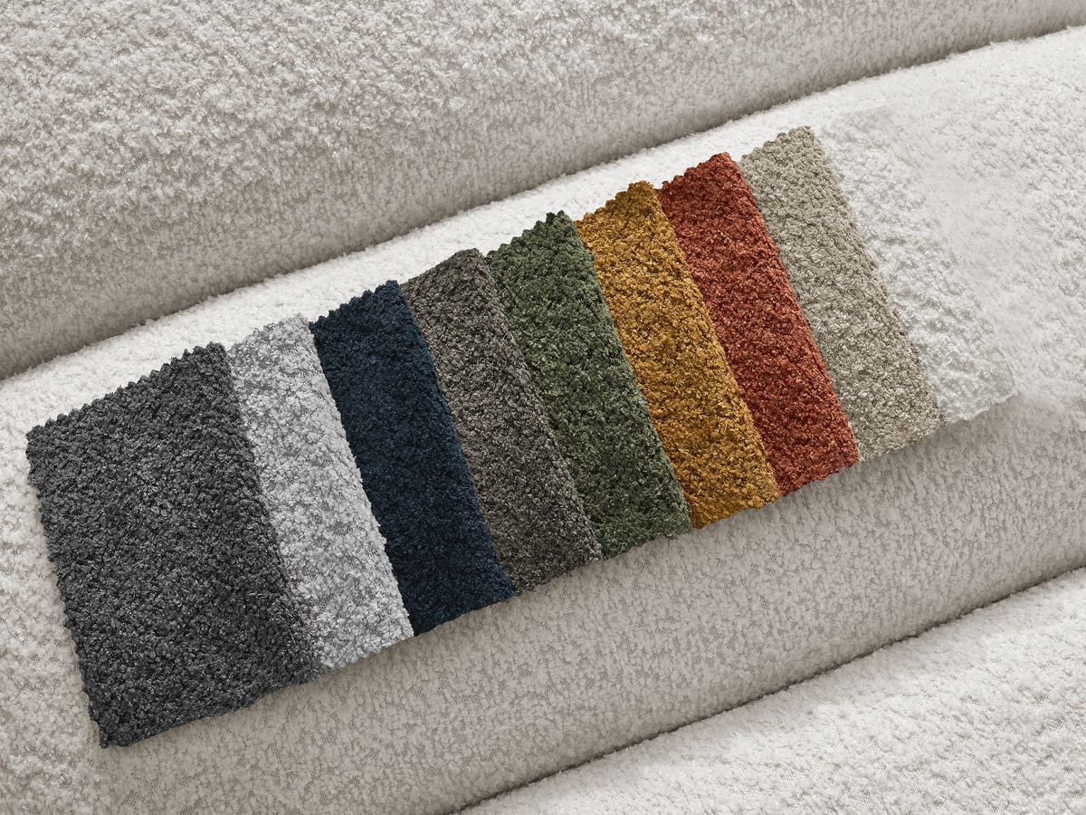 Canapé d'angle fixe TALIA tissu bouclette avec pouf - Angle gauche