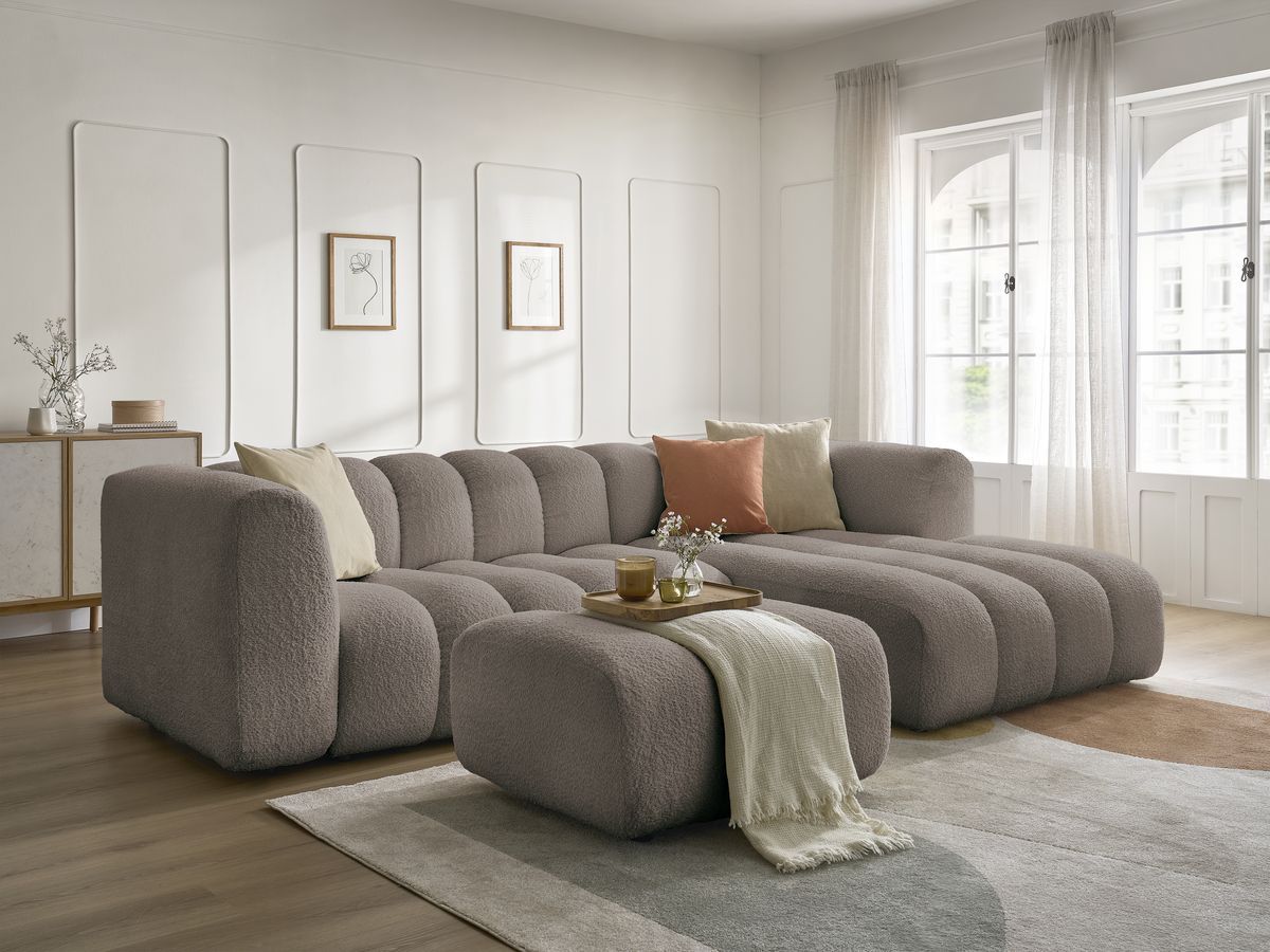 Canapé d'angle fixe TALIA tissu bouclette avec pouf - Angle droit