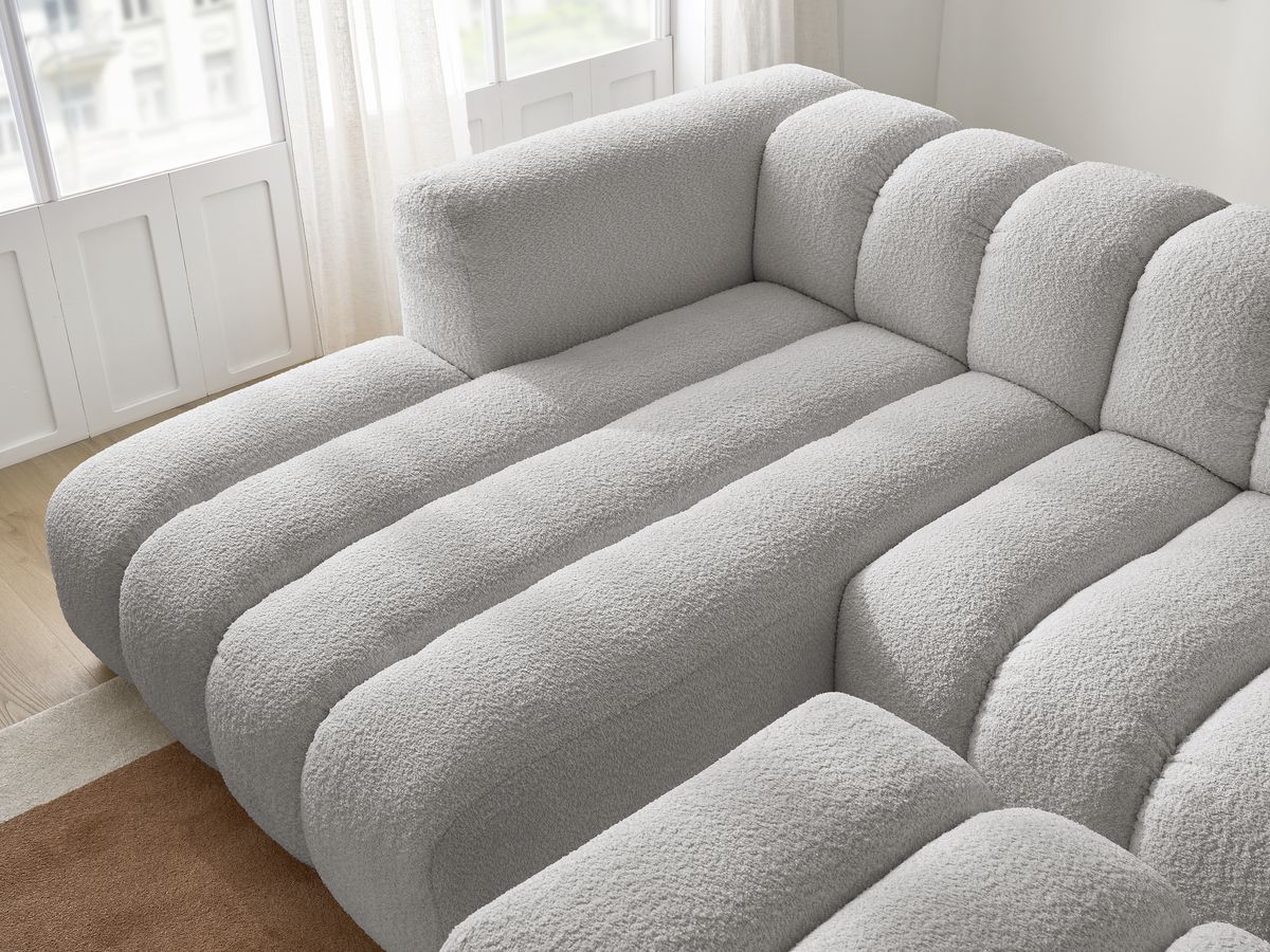 Canapé d'angle fixe TALIA tissu bouclette avec pouf - Angle gauche