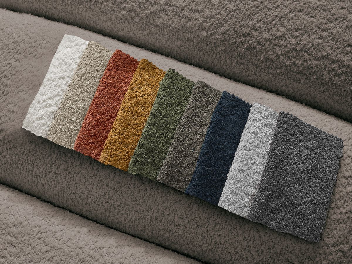 Canapé d'angle fixe TALIA tissu bouclette avec pouf - Angle droit