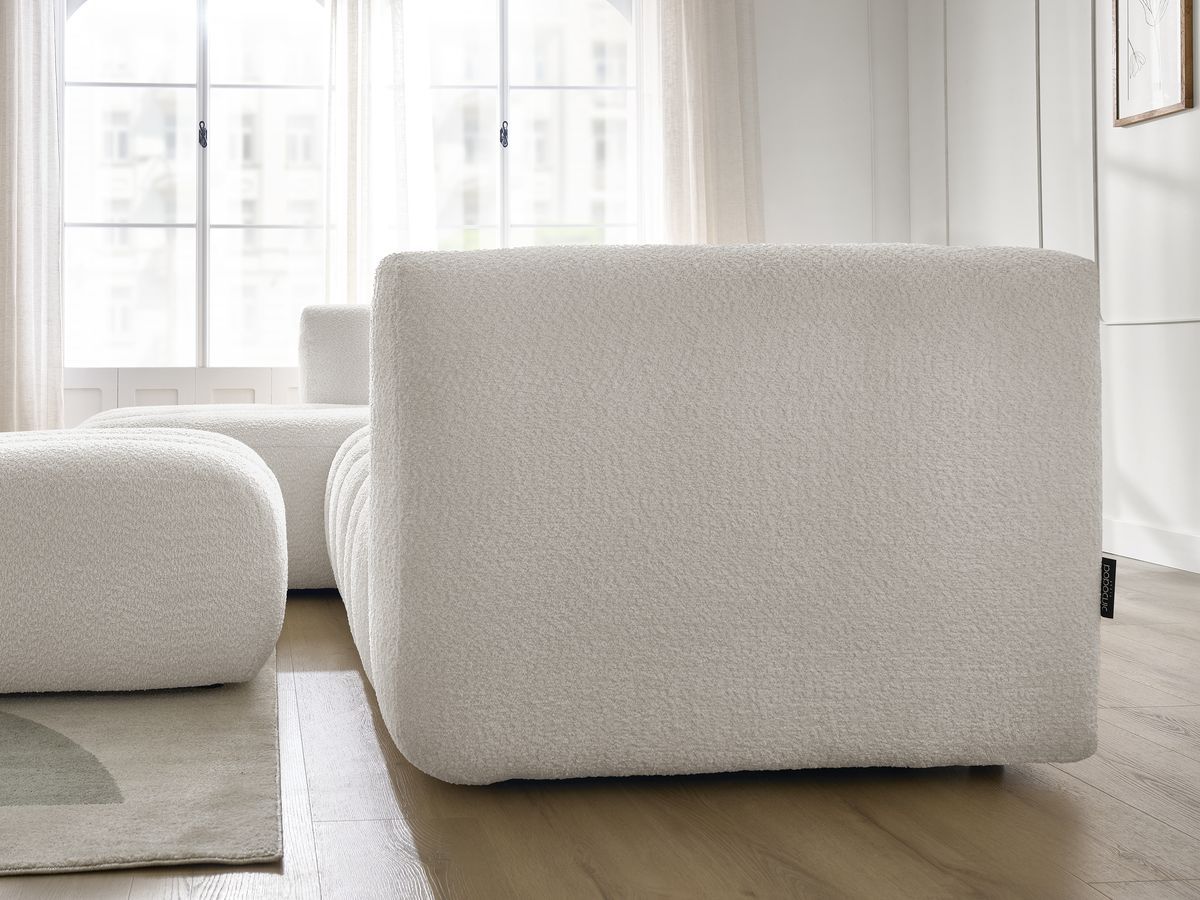 Canapé d'angle fixe TALIA tissu bouclette avec pouf - Angle gauche