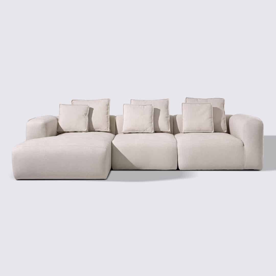 Canapé d'angle gauche modulable 4 places en tissu crème – Marbellia